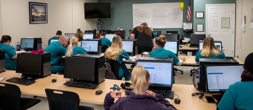 Valley College students learning in a computer lab.